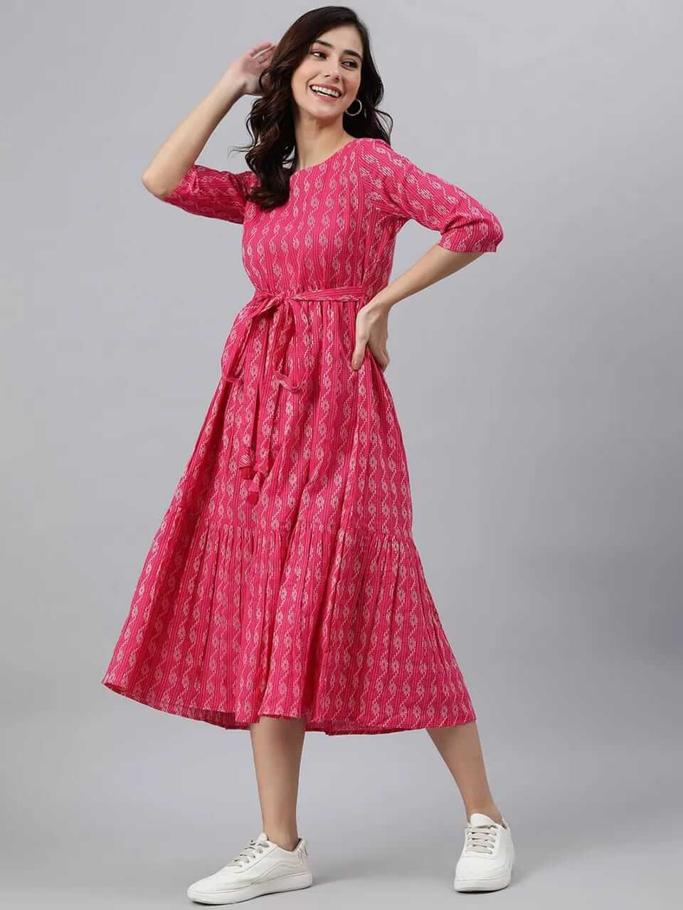 Pink printed midi dress for women designed for effortless style and comfort.